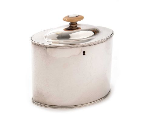 A George III silver tea caddy, by W.S, London 1792, of oval form with dome cover and ivory finial, working lock mechanism, 13