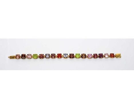 A synthetic gemstone bracelet, set with seventeen square step-cut colourful synthetic gemstones including spinel, zircon and 