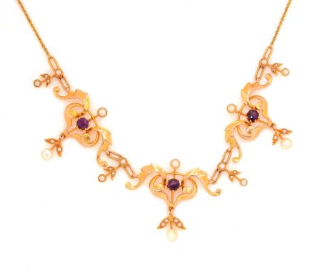 An Edwardian amethyst and pearl necklace, the three floral scroll plaques on cable link chain, stamped '15ct', 40cms long, 8.
