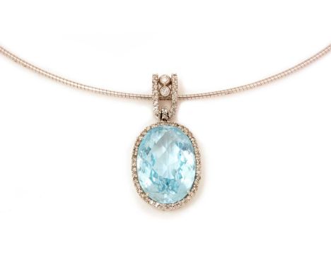 A topaz and diamond pendant by RJM, the fancy cut topaz measuring 18.0 x 13.0 x 9.0mm, surrounded by a diamond bezel, hanging