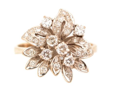 A diamond dress ring, the floral pattern mount set with brilliant cut diamonds weighing a total of approximately 0.40carats, 