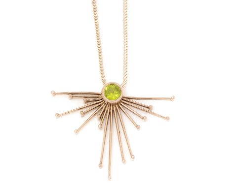 A limited edition pendant by Catherine Best, no.4 in Fireworks pattern, set with a single circular facet cut peridot in 18ct 