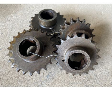 Eight Manx Norton engine sprockets.