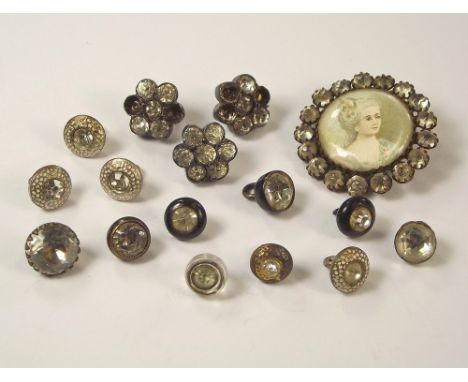 BUTTONS. A 19th century portrait button, in paste border & other paste set buttons in metal & glass.