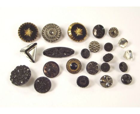 BUTTONS.A quantity of 19th century French jet & other glass buttons, including a moulded fly button.