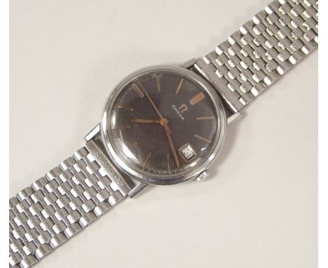 OMEGA CALIBRE 611. A gentleman's stainless steel cased Omega wristwatch c.1966/7. The black/brown linen-textured dial with go