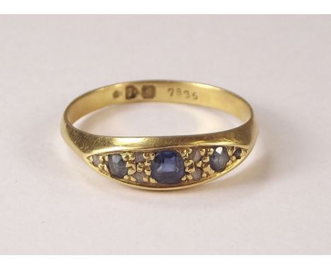 GOLD RING. A sapphire & diamond ring (possibly 18ct.). Chester 1907. Size P/Q.