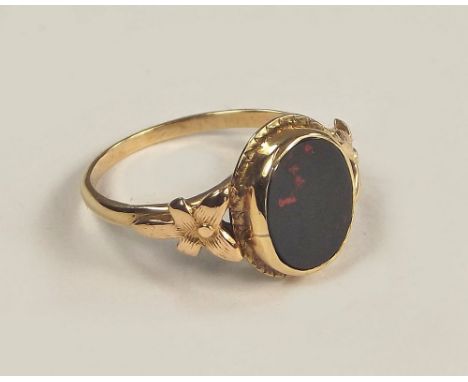 GOLD RING. A 10k. bloodstone set ring, with box. Size L.