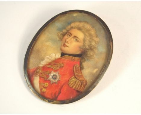 PORTRAIT MINIATURE.An oil portrait miniature on ivory, of a gentleman (possibly George IV, when Prince of Wales) in a red, br