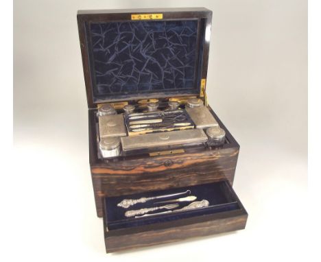 DRESSING CASE. A Victorian coromandel wood dressing case fitted with ten various silver mounted cut glass boxes & bottles, ea