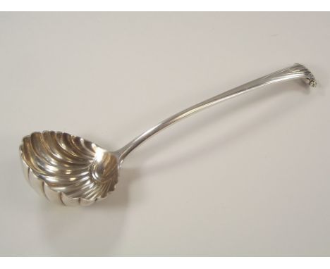 SILVER LADLE.A silver ladle by George Smith & William Fearn, with shell bowl, scroll handle & engraved crest. London 1789.