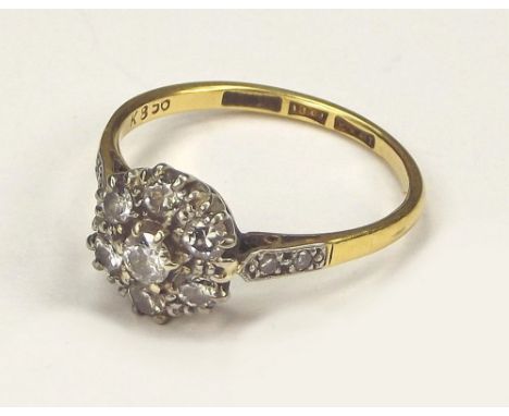 DIAMOND RING. An 18ct. gold & platinum diamond cluster ring. Size P. Approx. 2.8g.