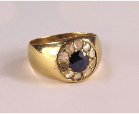 SAPPHIRE RING. A yellow metal ring set a sapphire & old cut diamonds. Size L.