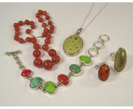 HARDSTONE JEWELLERY.Contemporary silver jewellery set with hardstones, a modern silver & 'amber' set ring & a carnelian neckl