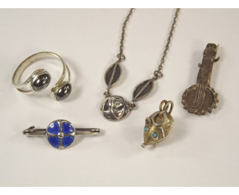 KIT HEATH ETC. A Kit Heath silver necklace, a blue enamelled silver pin, a haematite ring etc.
