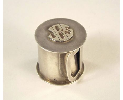 LEONORE DOSKOW. A vintage Leonore Doskow silver stamp roll dispenser. Stamped sterling 1980 & named to the base. Height 2.5cm