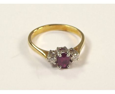 GOLD RING. An 18ct. gold ruby & diamond ring. Size P.