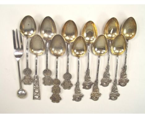 CHINESE SPOONS.A set of six Chinese silver/gilt dragon spoons by TH (Tack Hing?), five other Chinese spoons & a pastry fork.