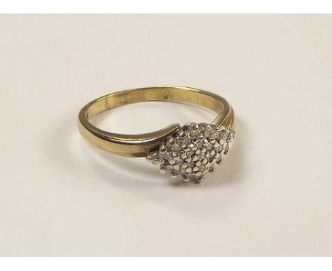 GOLD RING. A 9ct. gold diamond set ring. Size K.