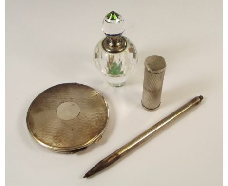 POWDER COMPACT ETC.A silver engine turned powder compact, a 935 standard engine turned lipstick case, an 835 standard ball po