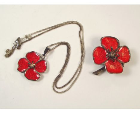 SILVER & ENAMEL. A modern silver & enamelled poppy brooch, with matching silver pendant & chain.