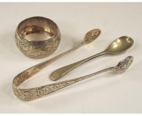 NAPKIN RING ETC.An Edwardian napkin ring, a pair of Victorian sugar tongs & an EPNS condiment spoon.