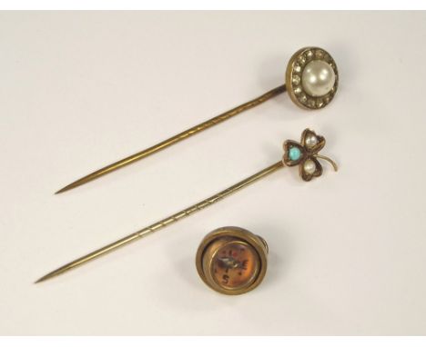 STICK PINS ETC. Two pearl set stick pins & a brass mounted gimbal compass fob.