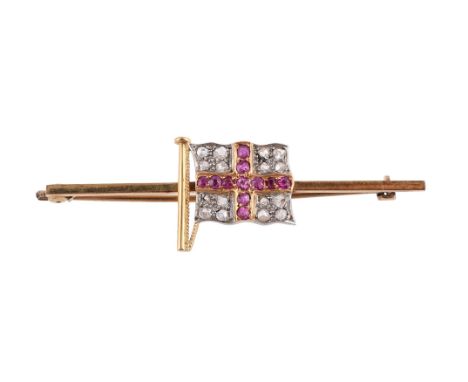 A RUBY AND DIAMOND FLAG BROOCH The polished bar mounted with the England flag, the St George's cross set with rose-cut diamon