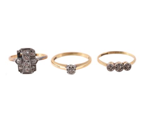 
	
		THREE DIAMOND SET RINGS 
		The first with a shaped diamond set panel, approximately 0.24 carats total, the shank stamped