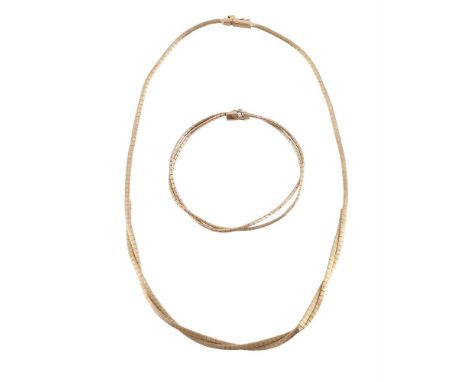 
	
		A 9 CARAT GOLD NECKLACE AND BRACELET
		LONDON 1976 IMPORT MARK 
		The necklace with textured brick links to a concealed 