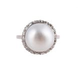 A MID 20TH CENTURY DIAMOND AND CULTURED PEARL CLUSTER RING