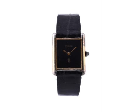 
	
		Y&nbspCARTIER, MUST DE CARTER TANK 
		A SILVER GILT WRISTWATCH, NO. 6 007662
		Movement: Manual wind
		Case: Silver gilt