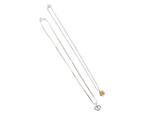 
	
		TWO PENDANTS ON CHAINS 
		The pierced heart shaped pendant with an eight cut diamond accent, stamped 585, suspended from