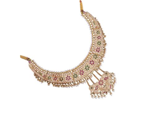 
	
		AN INDIAN RUBY, EMERALD AND CULTURED PEARL CRESCENT PANEL NECKLACE  
		The articulated graduated crescent with cultured 