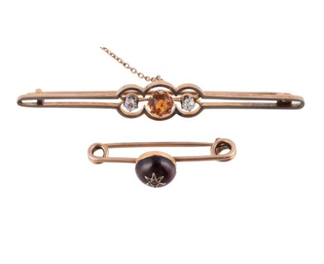 
	
		TWO BAR BROOCHES 
		The first an early 20th century bar brooch with a central circular cut citrine flanked by two old Eu