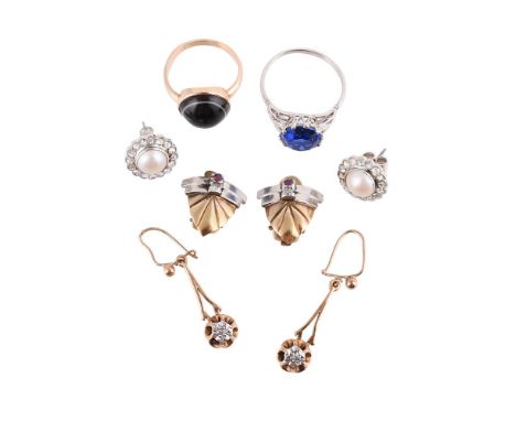 
	
		TWO RINGS AND THREE PAIRS OF EARRINGS 
		The first ring set with a synthetic blue stone, to foliate shoulders, the shank