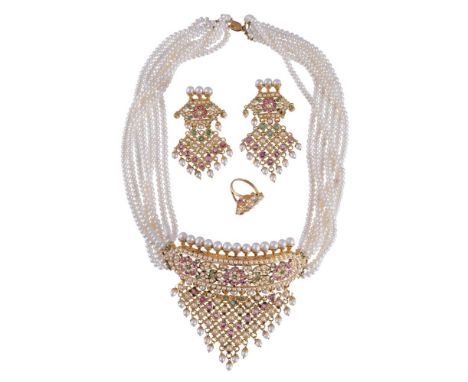 
	
		AN INDIAN SEVEN STRAND FRESHWATER PEARL, EMERALD AND RUBY COLLAR, EARRINGS AND RING 
		The pierced floral panel with an 