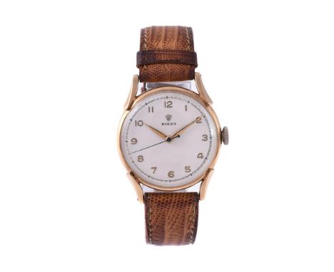
	
		ROLEX
		A 9 CARAT GOLD WRISTWATCH, NO. 638701, CIRCA 1951
		Movement: Manual wind, 15 jewels
		Case: 9 carat gold case, 