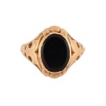 A 19TH CENTURY ONYX SIGNET RING