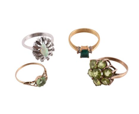 
	
		FOUR GEM SET RINGS 
		The first with a marquise cabochon opal within a polished petal shaped surround with brilliant cut