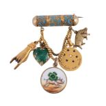 A LATE 19TH/EARLY 20TH CENTURY CHARM BROOCH