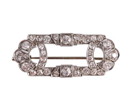 
	
		AN AUSTRIAN EARLY 20TH CENTURY DIAMOND PIERCED PANEL BROOCH 
		The rectangular panel with lobed terminals set with gradu