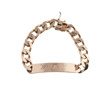 
	
		AN IDENTITY BRACELET 
		The front panel engraved &#39;W Todd&#39;, to a flattened curb link bracelet, with concealed cla