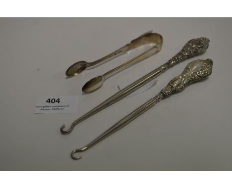 Pair of Silver Handled Button Hooks and Silver Sugar Tongs 