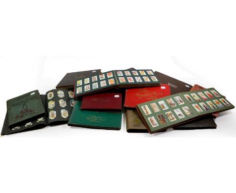 Cigarette Cards A Collection Of Assorted Sets In 14 Slot In Albums including Players Army Corps &amp; Divisional Signs 1914-1