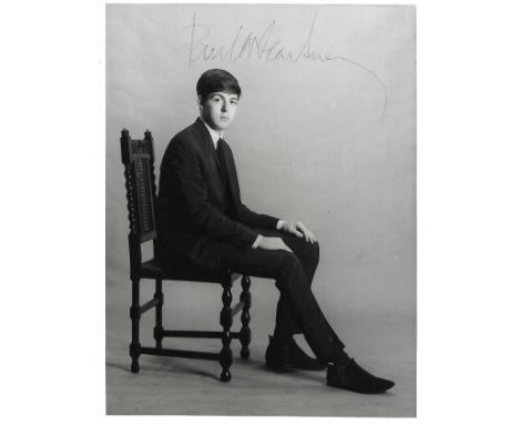 Astrid Kirchherr photograph of Paul McCartney sold at NEMS Liverpool signature on the front is by Neil Aspinall. The item is 