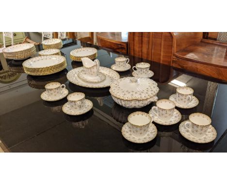 SPODE 'FLEUR DE LYS-GOLD' DINNER SERVICE, comprising eight cups, eight saucers, eight side plates, eight dessert plates, eigh