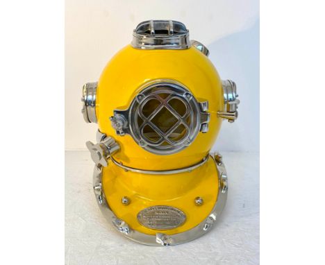 DISPLAY DIVING HELMET, decorative reproduction US Navy design, lacquered yellow finish, 46cm x 46cm x 45cm. 