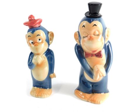A Goebel Hummel figure of a monkey in top hat, 19cm high, marked beneath, and another with removable hat smaller.