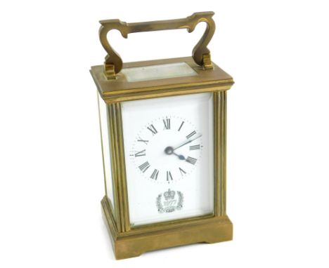 A 20thC Silver Jubilee brass carriage clock, with Royal Crest to the 6cm wide Roman numeric dial, in a five part glazed case,